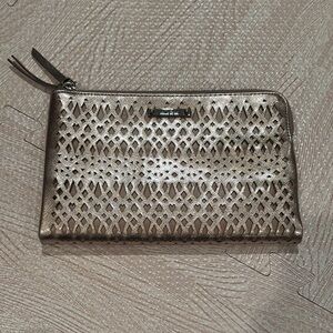 Stella & Dot metallic gold perforated clutch